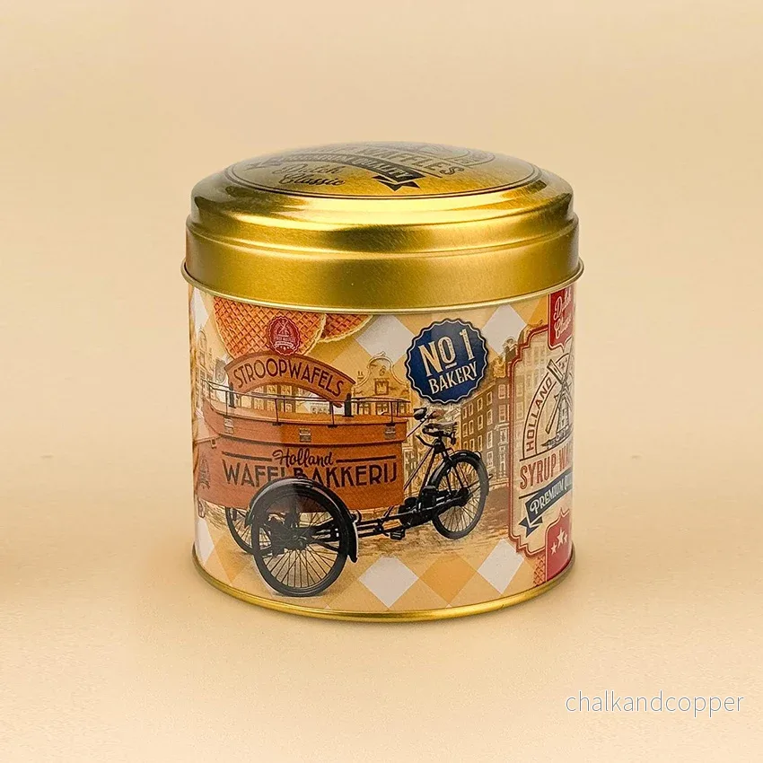 Hollandsk burk som passar för sirapsvåfflor i lastcykel Holland gul retro-stil