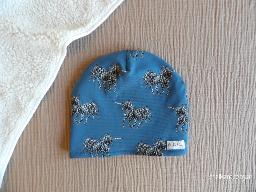 Fodrad barnmössa i merinoull, Blue Unicorn, storlek 48/50 & 50/52 – Bud´s Wardrobe