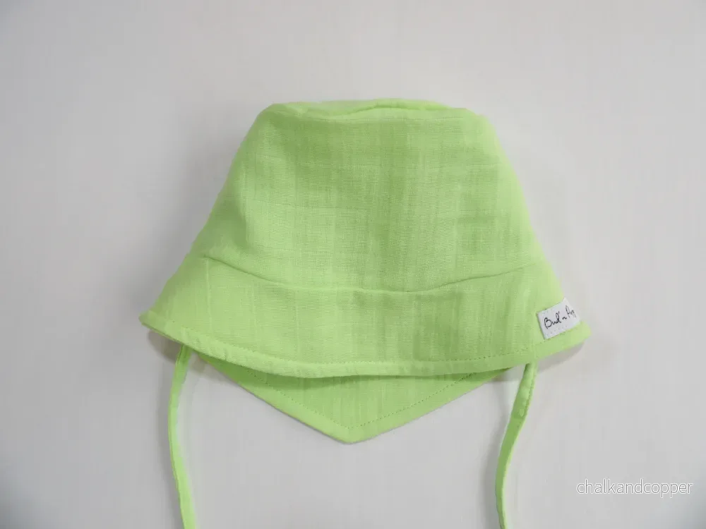 Solhatt i Muslin Lime Sprout – storlek 44/46 (ca 4-9 mån)