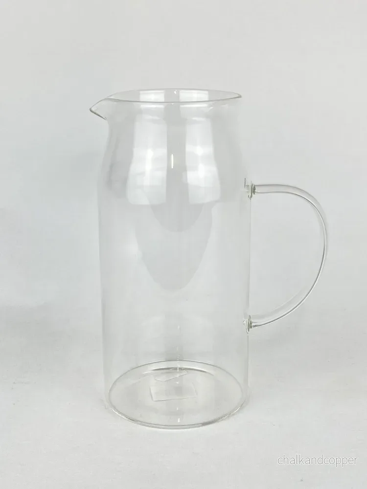 Tillbringare i glas med handtag Tillbringare i glas med handtag